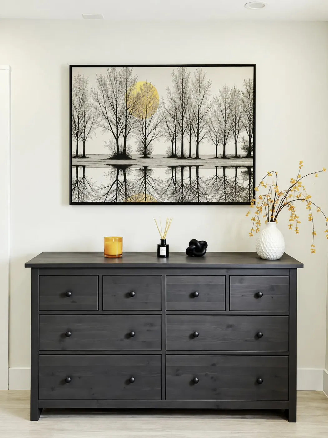 Clock Canvas framed tree reflection art above a dark dresser in a customer's home