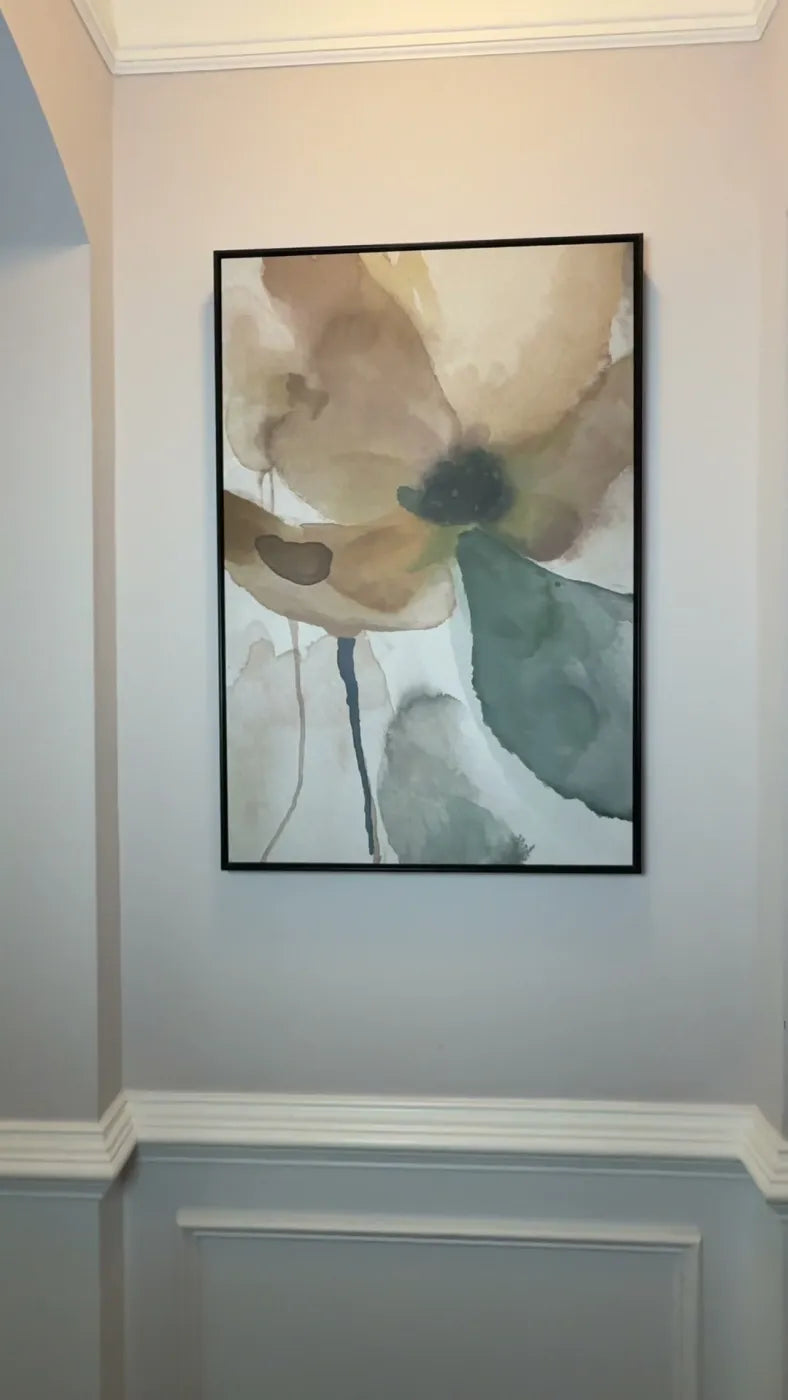 Clock Canvas framed watercolor flower art on a customer's stairway wall