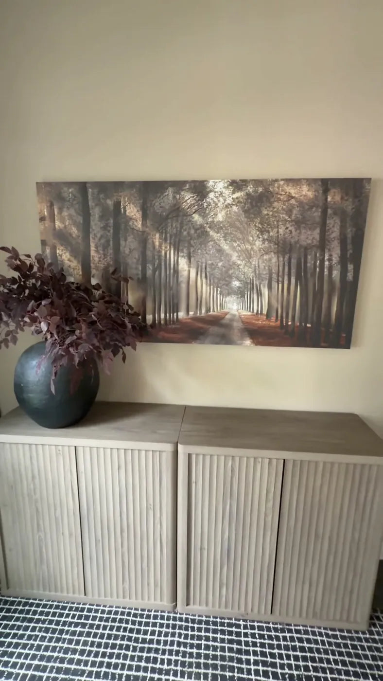 Clock Canvas Forest Strolls canvas above a sideboard in a customer's home